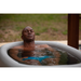 Cryospring inflatable tub with man inside