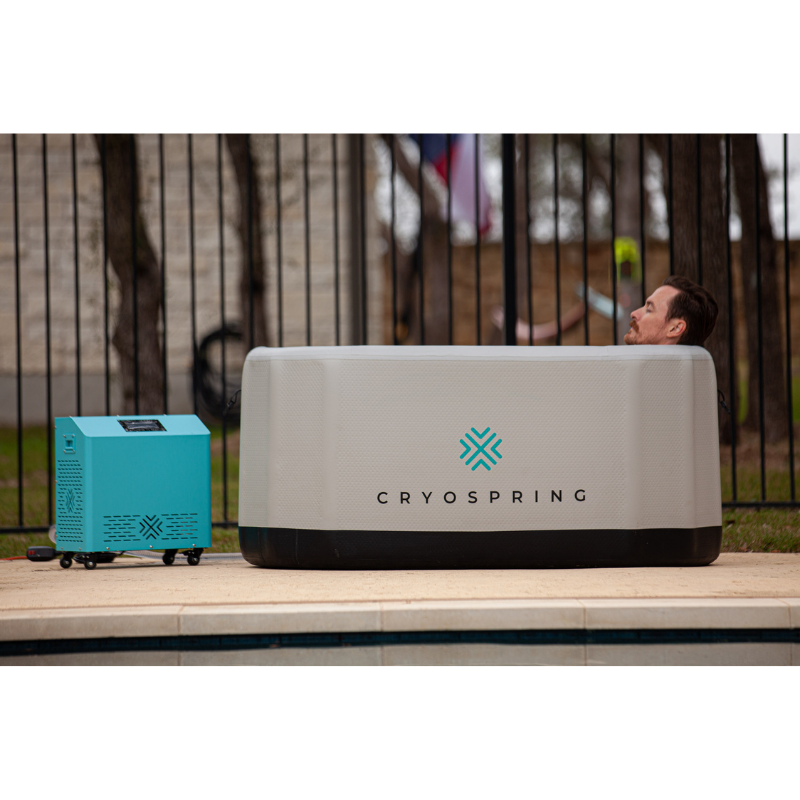Person in Cryospring Inflatable Tub With Chiller