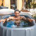 trugrit inflatable tub with man sitting inside